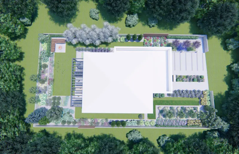 Nasłoneczniony ogród w mieście pełen bylin